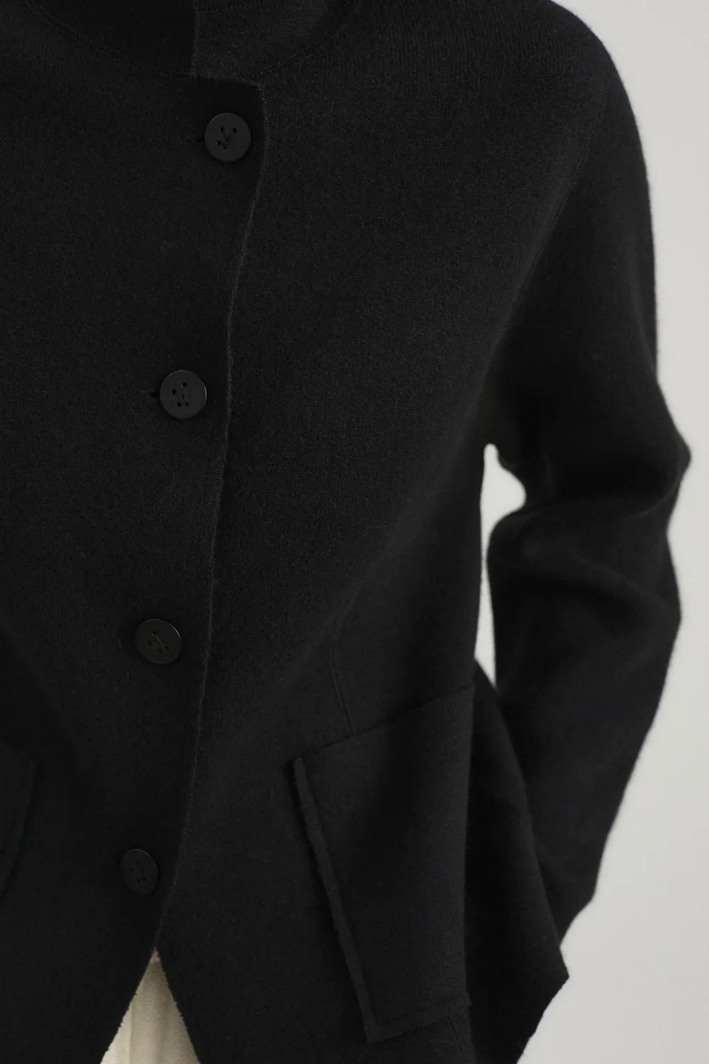 Oyuna Niaza Jacke Black wendbar